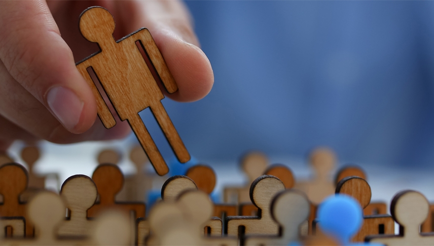 hand selecting a person
