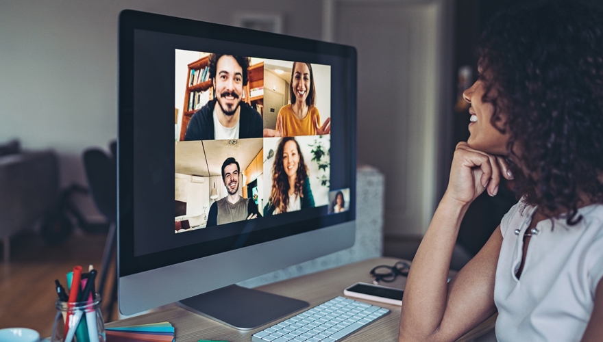 woman on video call with colleagues