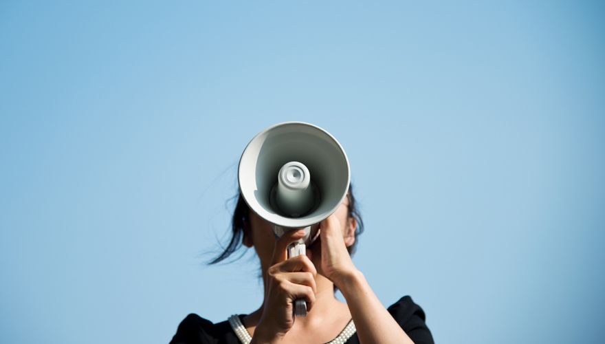 woman using loudspeaker
