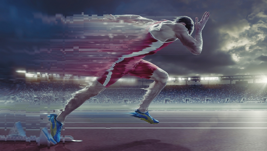 Athlete running fast on track