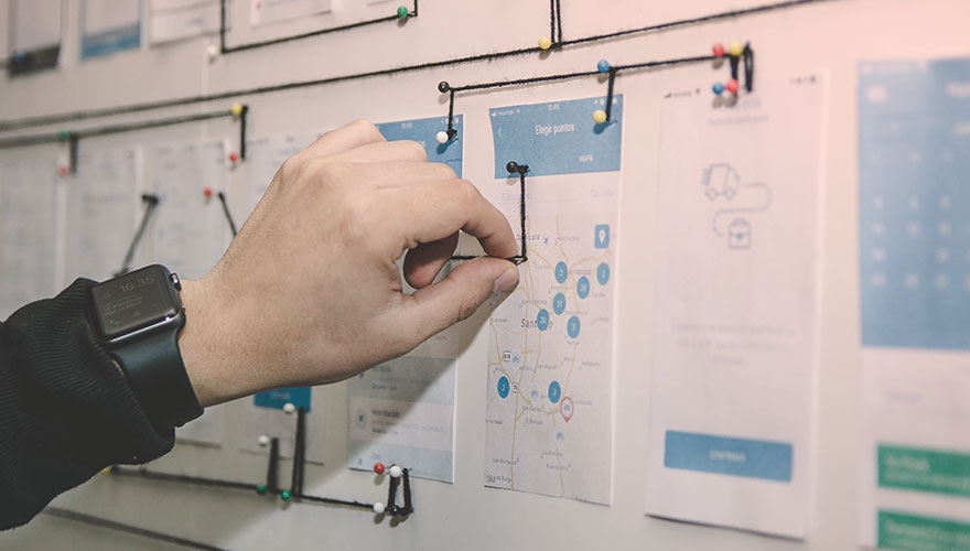 Decision-making process mapped on a pinboard