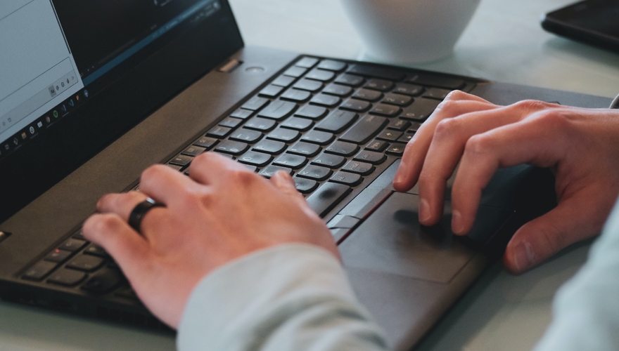 typing on laptop